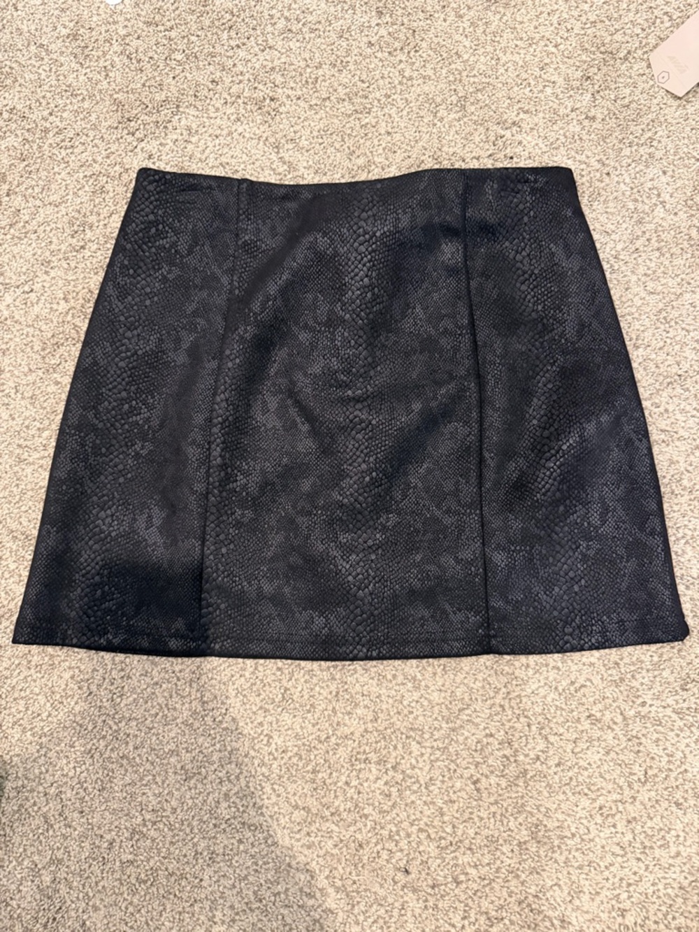 eesome Black Textured Mini Skirt with Subtle Snake Print